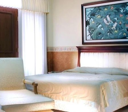 Umm Inn Hotel Malang Rum bild
